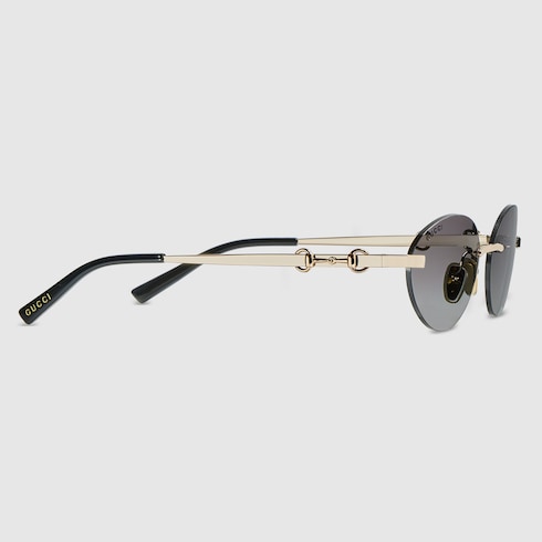 Oval rimless grey sunglasses