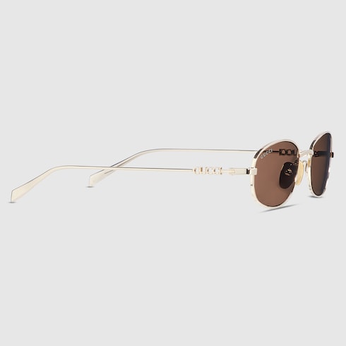Shiny light gold-tone metal oval sunglasses