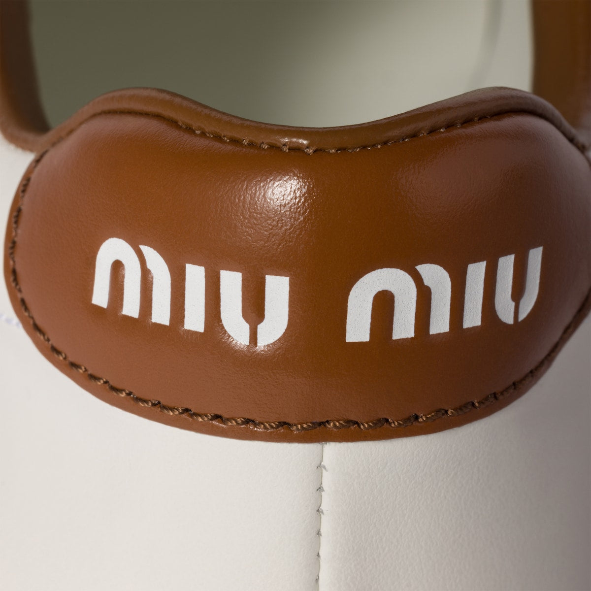 White/brown leather sneakers
