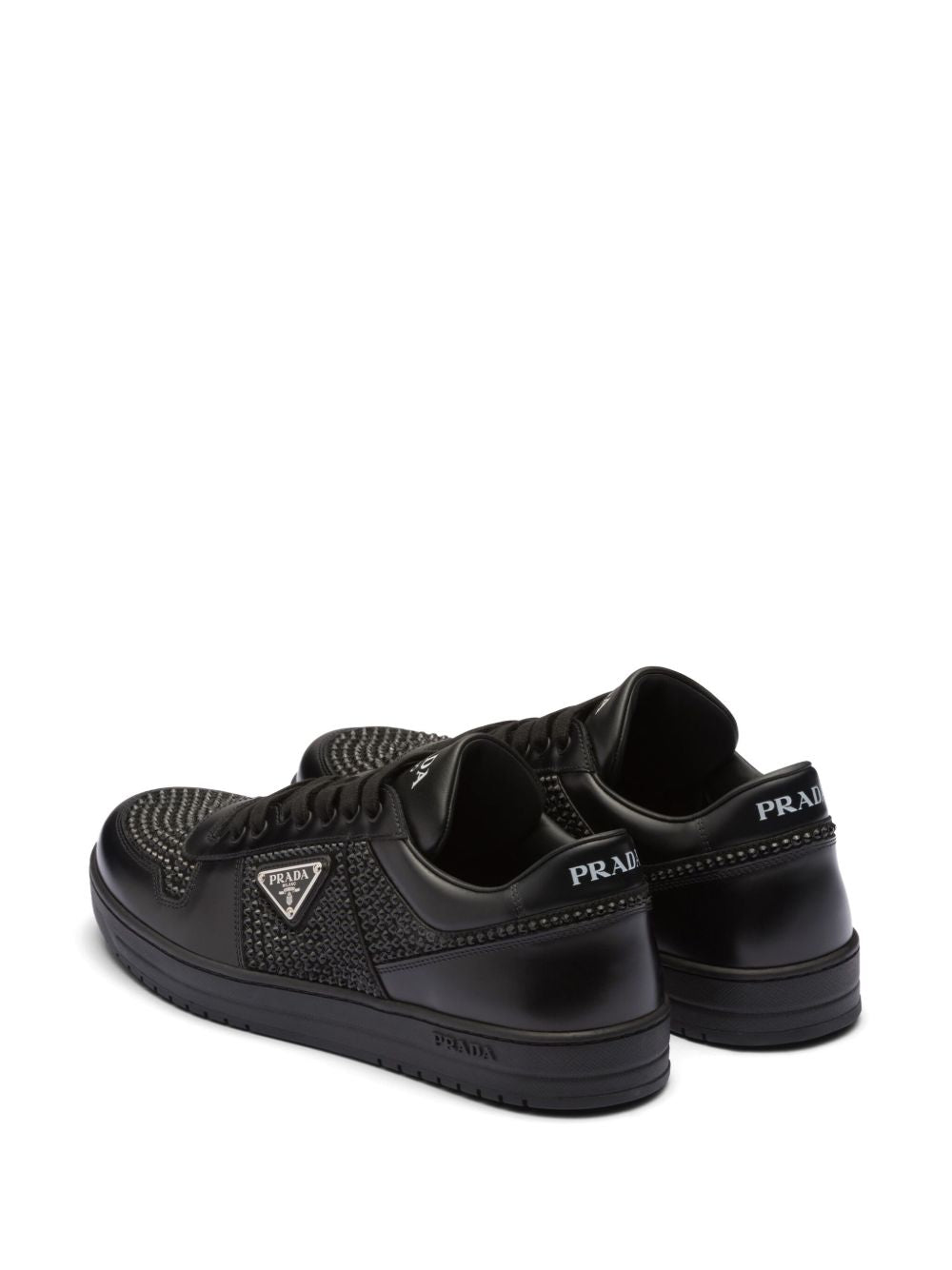 Black leather sneakers embellished with crystals