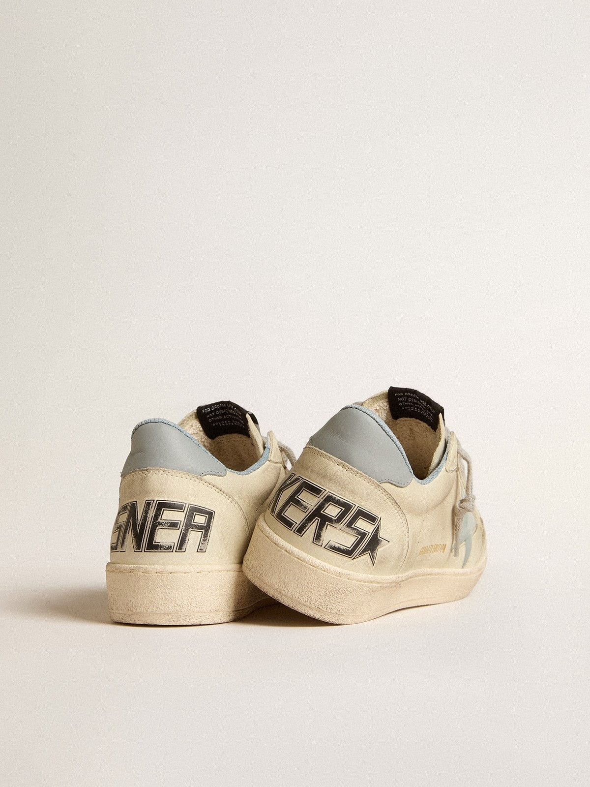 LTD con stella in plastica azzurro chiaro e talloncino in pelle sul retro