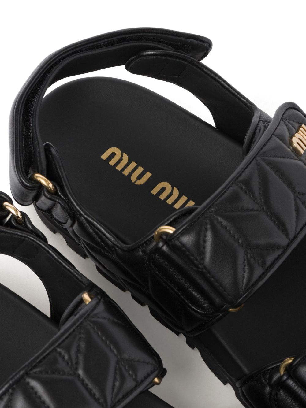 Black quilted leather sandals