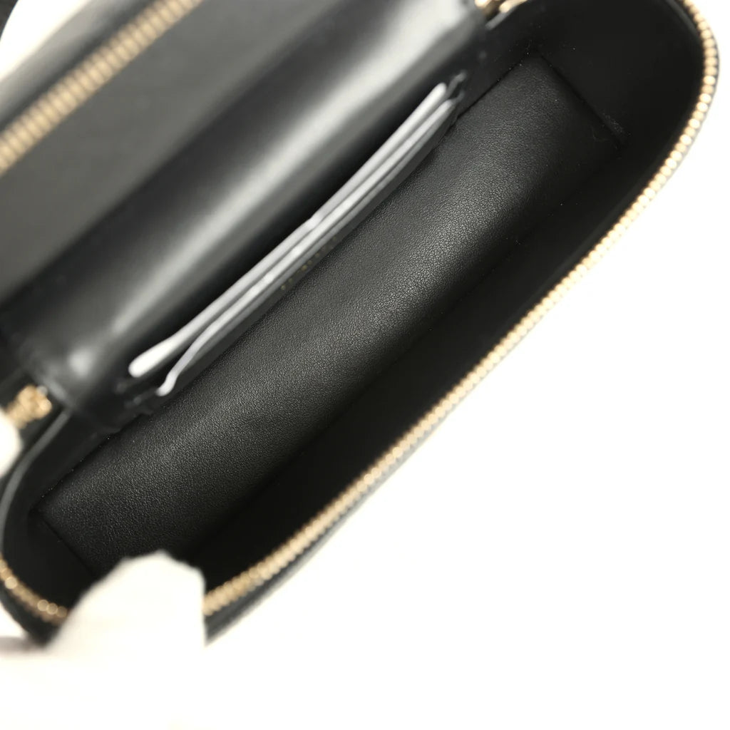Vanity Case mit Griff oben aus gestepptem schwarzem Lammleder