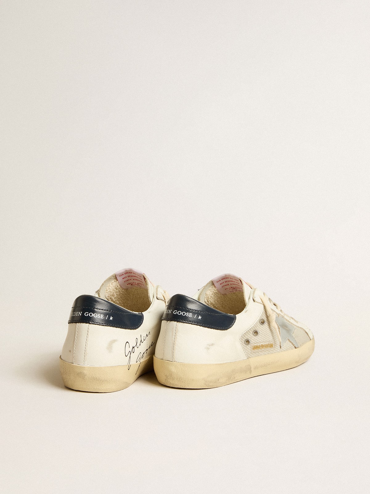 LTD in mesh and leather with silver star and blue heel tab