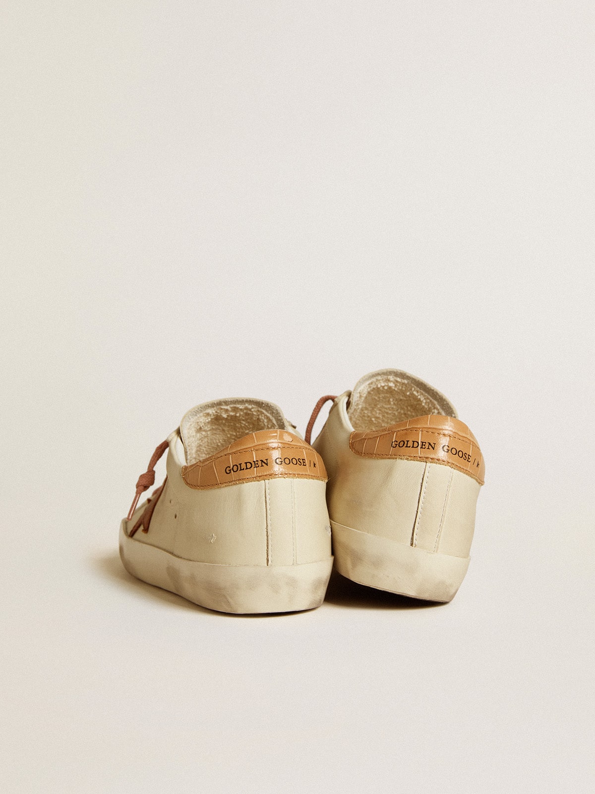 Leather star and crocodile-print leather heel tab