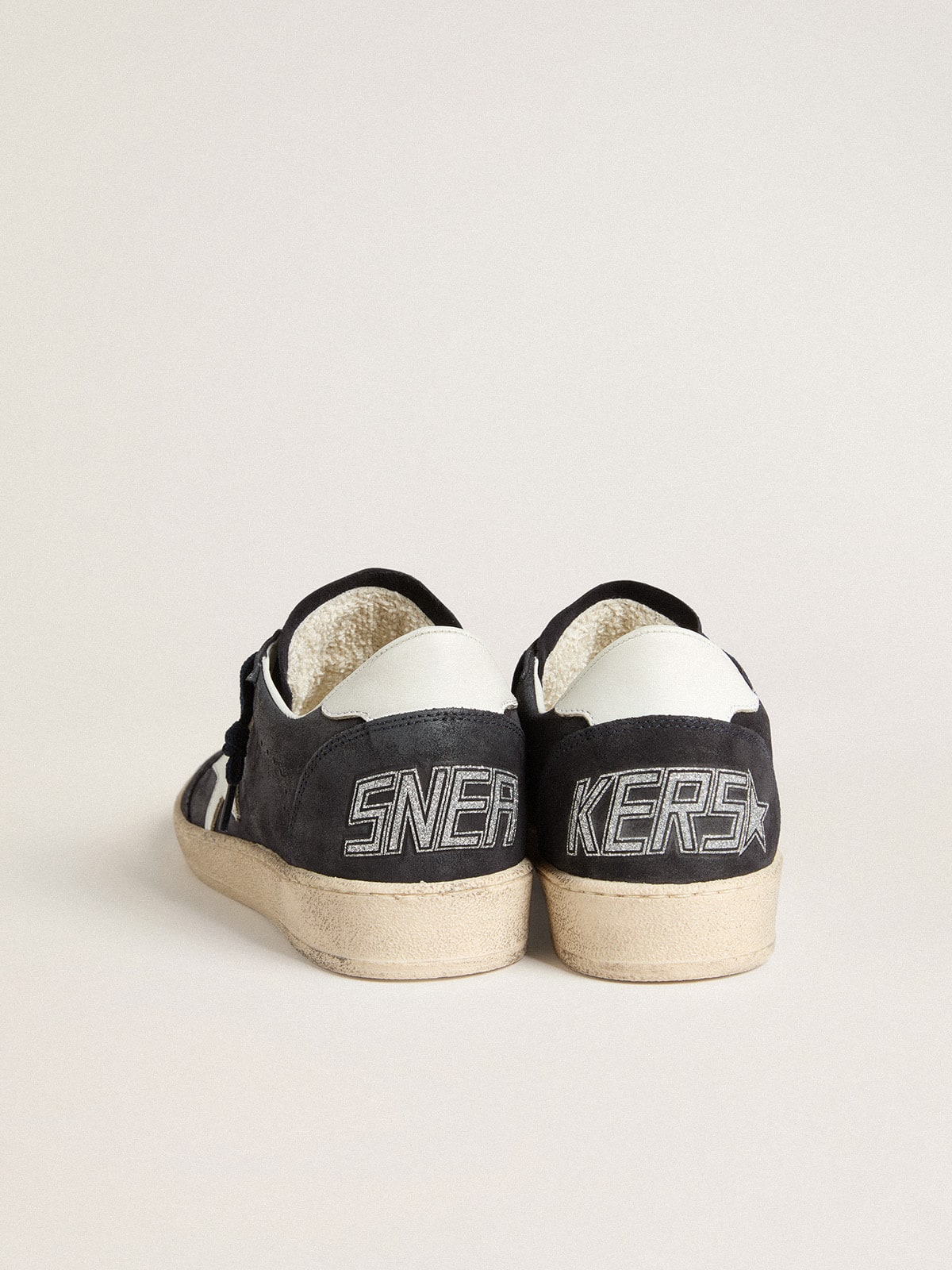 Dark blue suede with star and leather heel tab