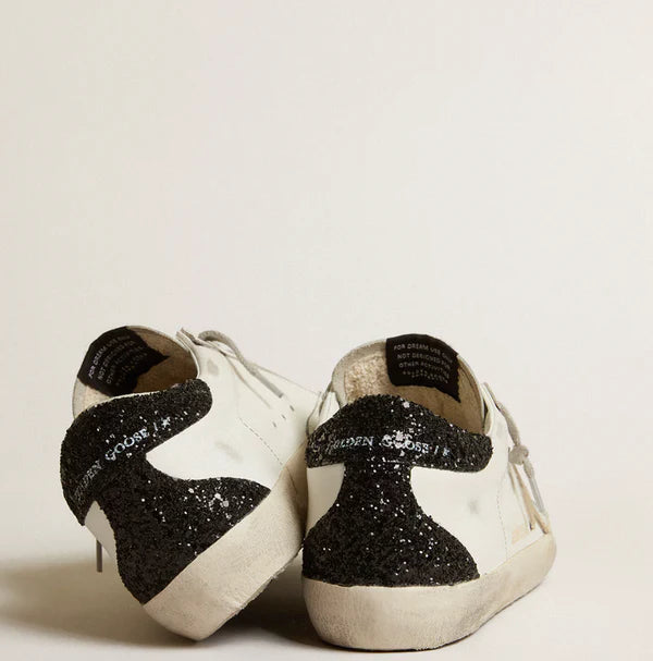 Gold star and black glitter tag