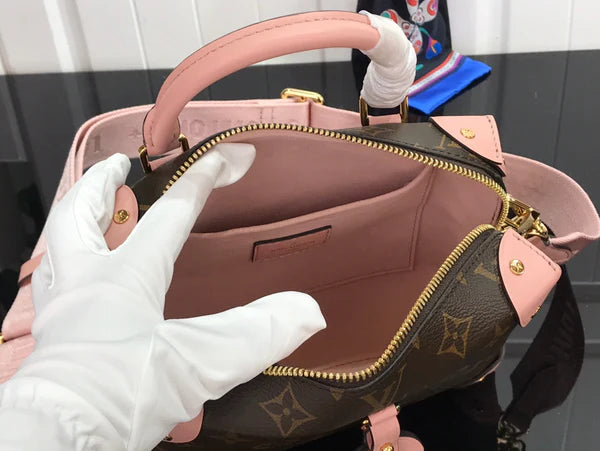 LV PETITE MALLE SOUPLE Rosa