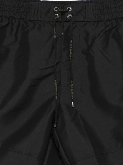 Pantaloncini da bagno con chiusura a zip e dettaglio