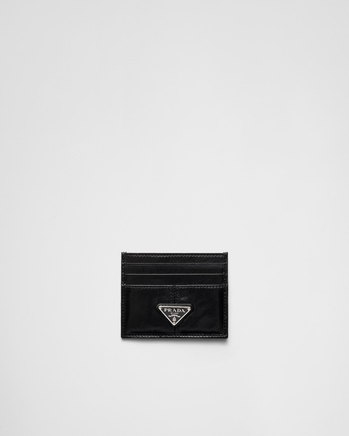 Black leather card holder with triangle logo