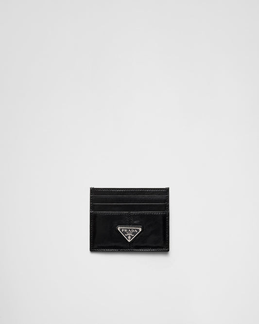Portacarte in pelle nera con logo triangolare