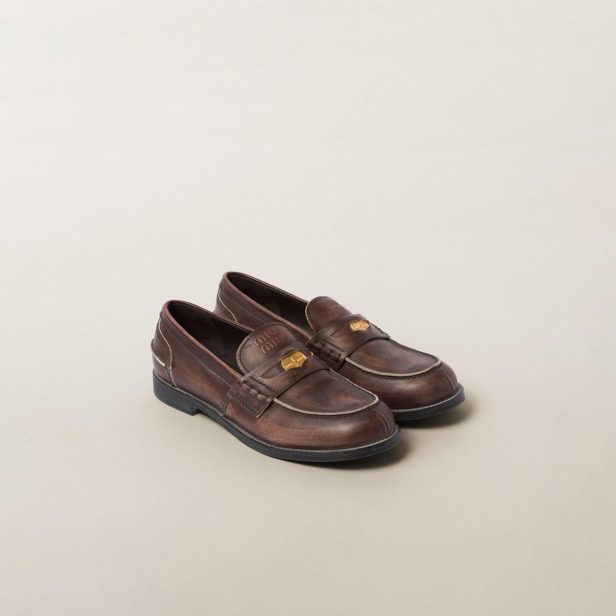 Brown vintage-effect leather loafers