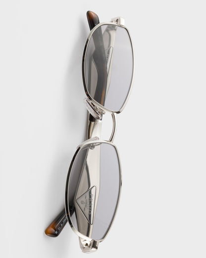 Silver acetate oval sunglasses with gray lenses