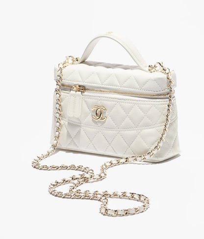 Vanity case with glossy white calfskin handle and gold-tone metal details