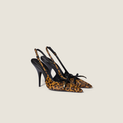 Honey-colored printed leather slingback pumps with bow