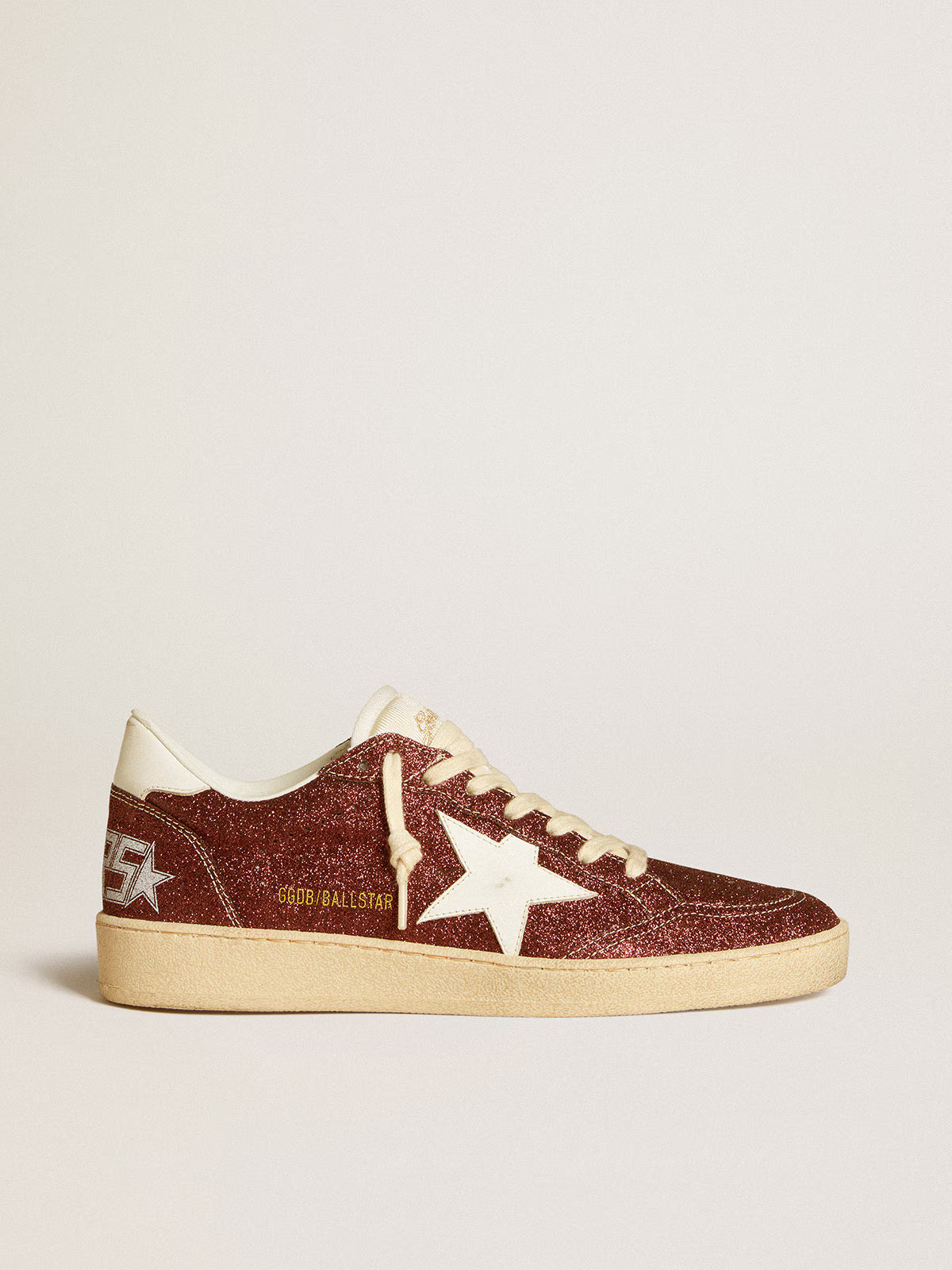 Bordeaux glitter with star and white leather tag