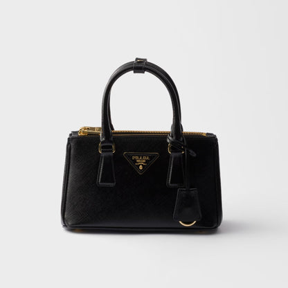 Mini Galleria bag in black patent Saffiano leather