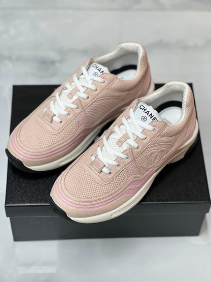 Sneakers in pelle scamosciata a rete rosa
