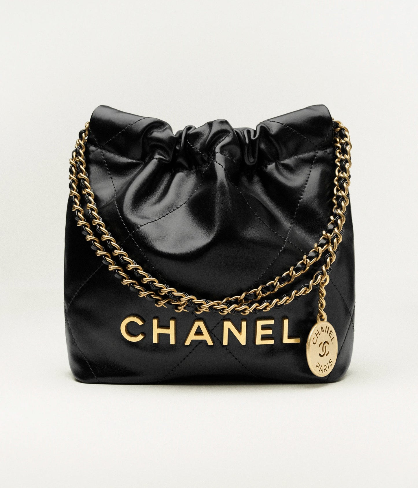 Mini 22 bag in shiny black calfskin and gold-tone metal
