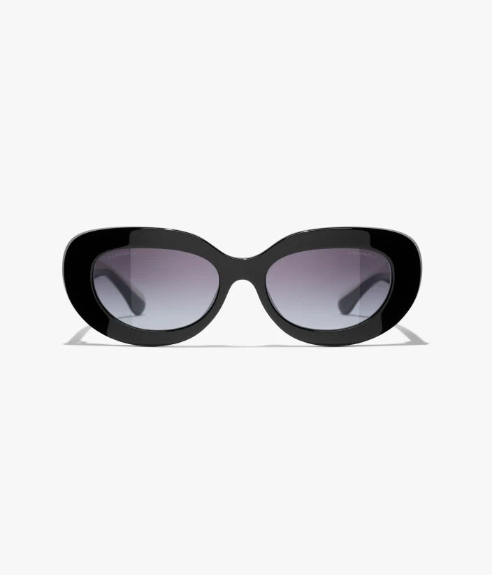 Occhiali da sole ovali bicolori in acetato nero con lenti grigie