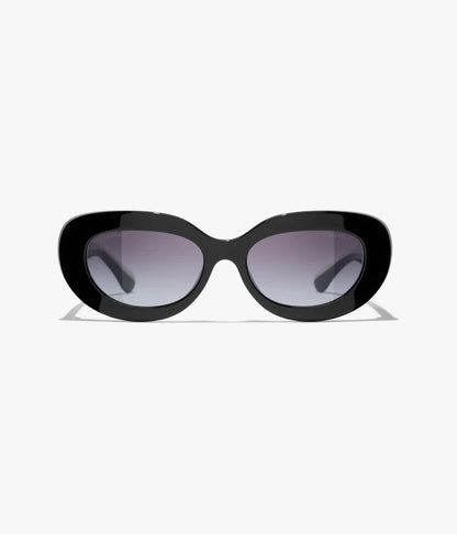 Occhiali da sole ovali bicolori in acetato nero con lenti grigie