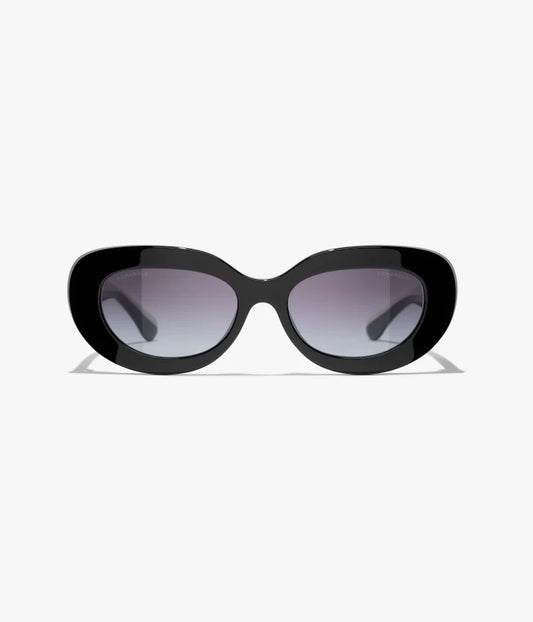 Occhiali da sole ovali bicolori in acetato nero con lenti grigie