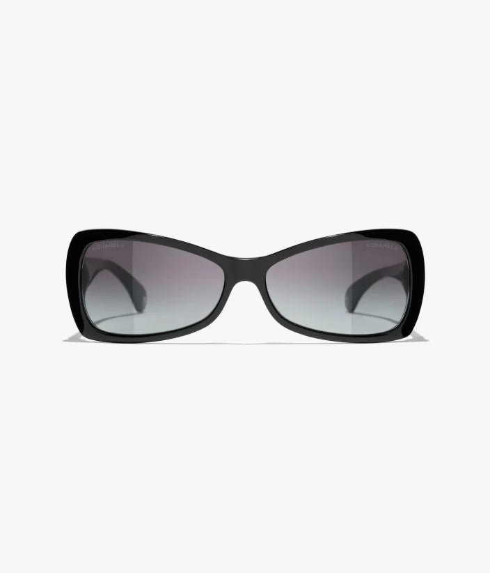 Occhiali da sole Butterfly in acetato nero con lenti grigie sfumate