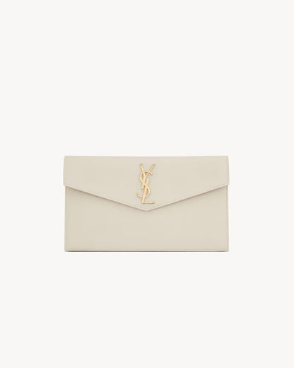 Pochette UPTOWN in pelle goffrata grain de poudre