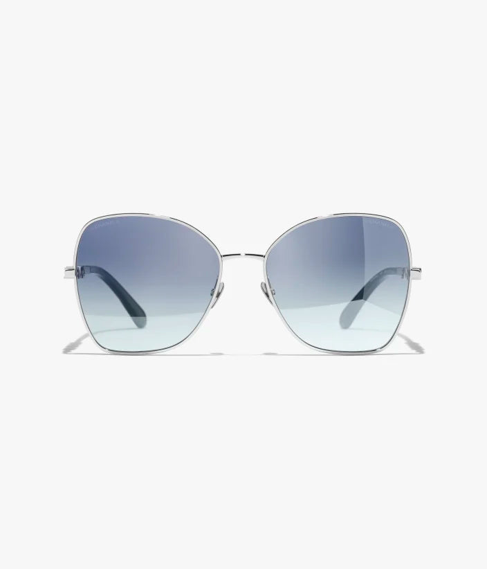 Occhiali da sole Butterfly con montatura in metallo argentato e lenti blu a specchio sfumate