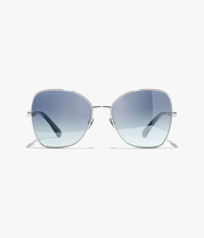 Occhiali da sole Butterfly con montatura in metallo argentato e lenti blu a specchio sfumate