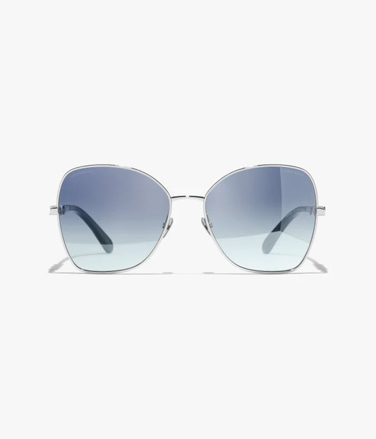 Occhiali da sole Butterfly con montatura in metallo argentato e lenti blu a specchio sfumate