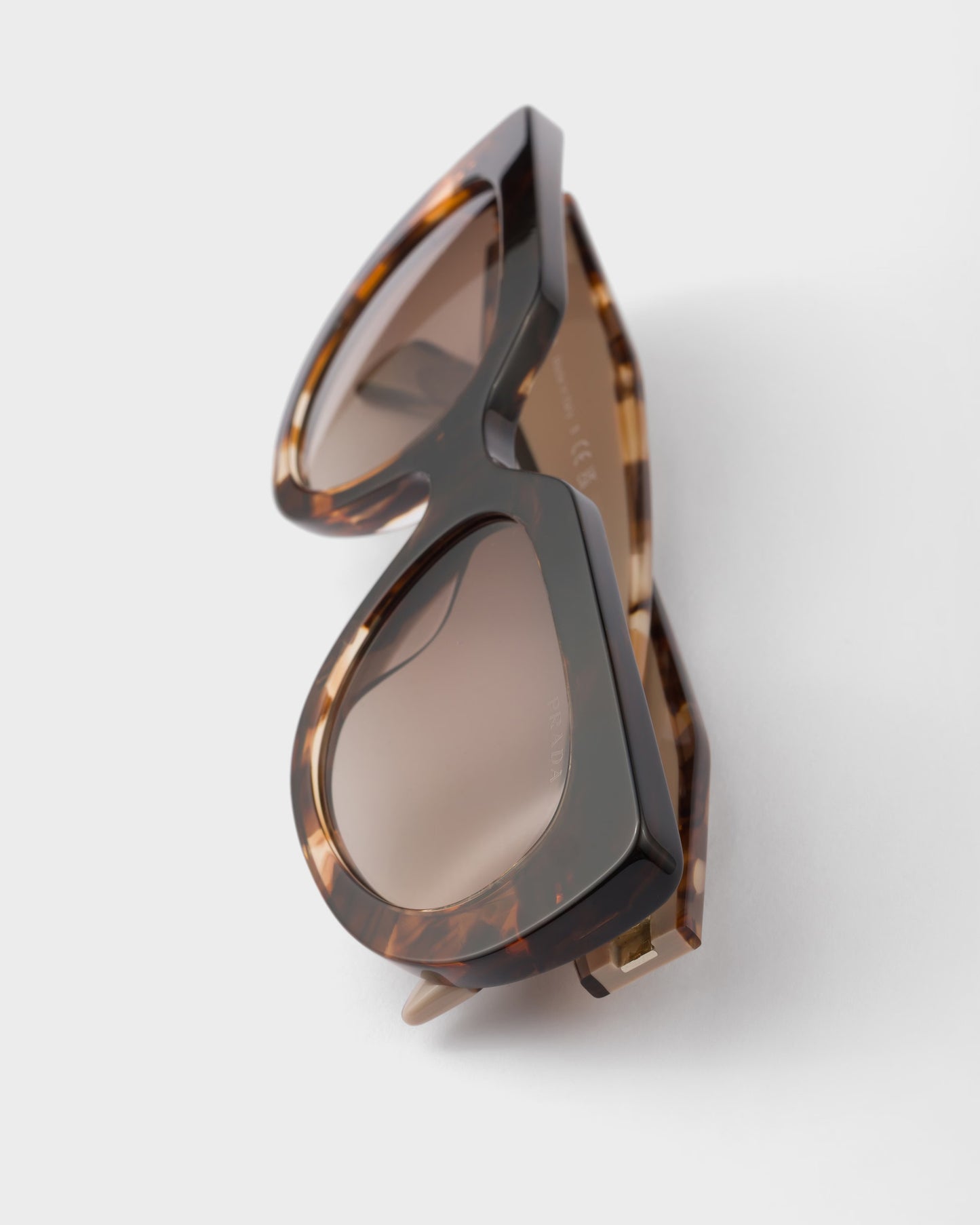 Oval sunglasses with logo and coffee lenses
