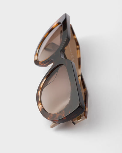 Oval sunglasses with logo and coffee lenses