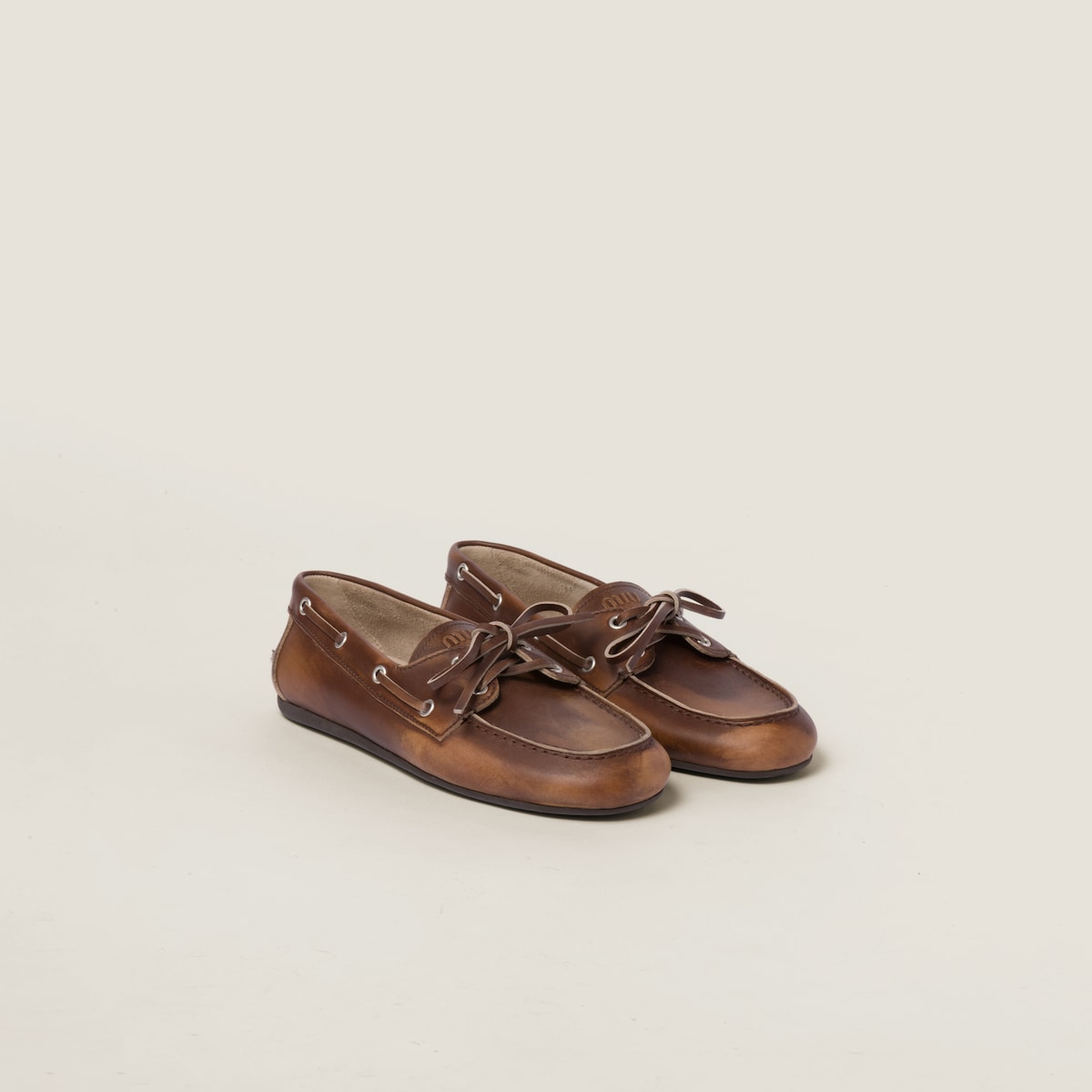 Unlined brown faded leather boat shoes