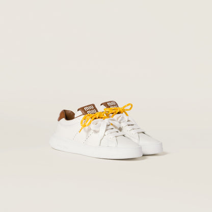 White/brown leather sneakers