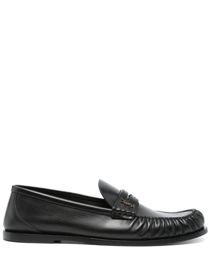 Black leather loafers