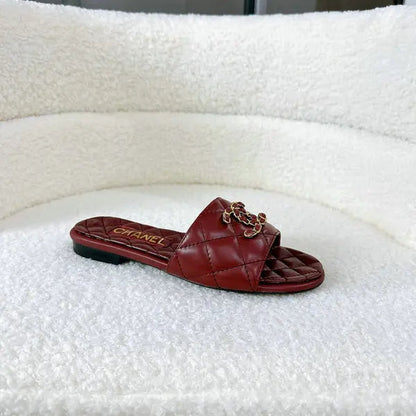 Burgundy quilted leather slides with interwoven C logo