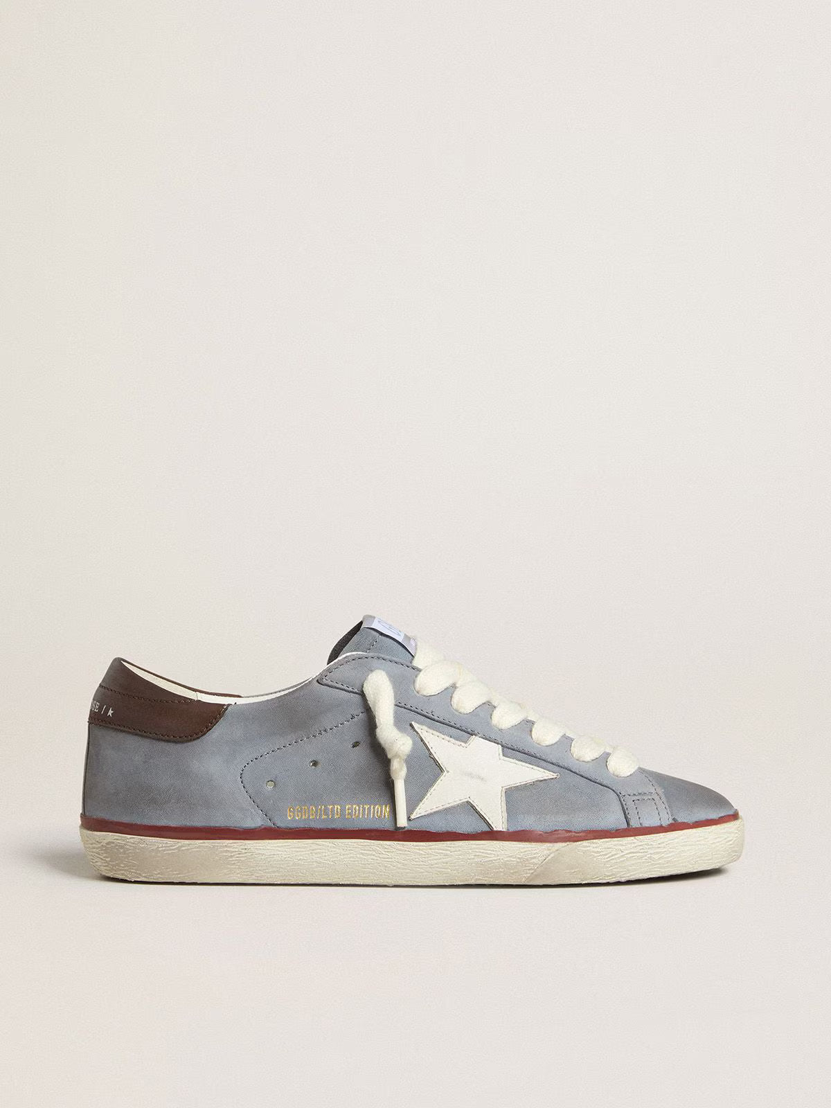 Light blue nubuck leather LTD with white leather star and brown leather heel tab