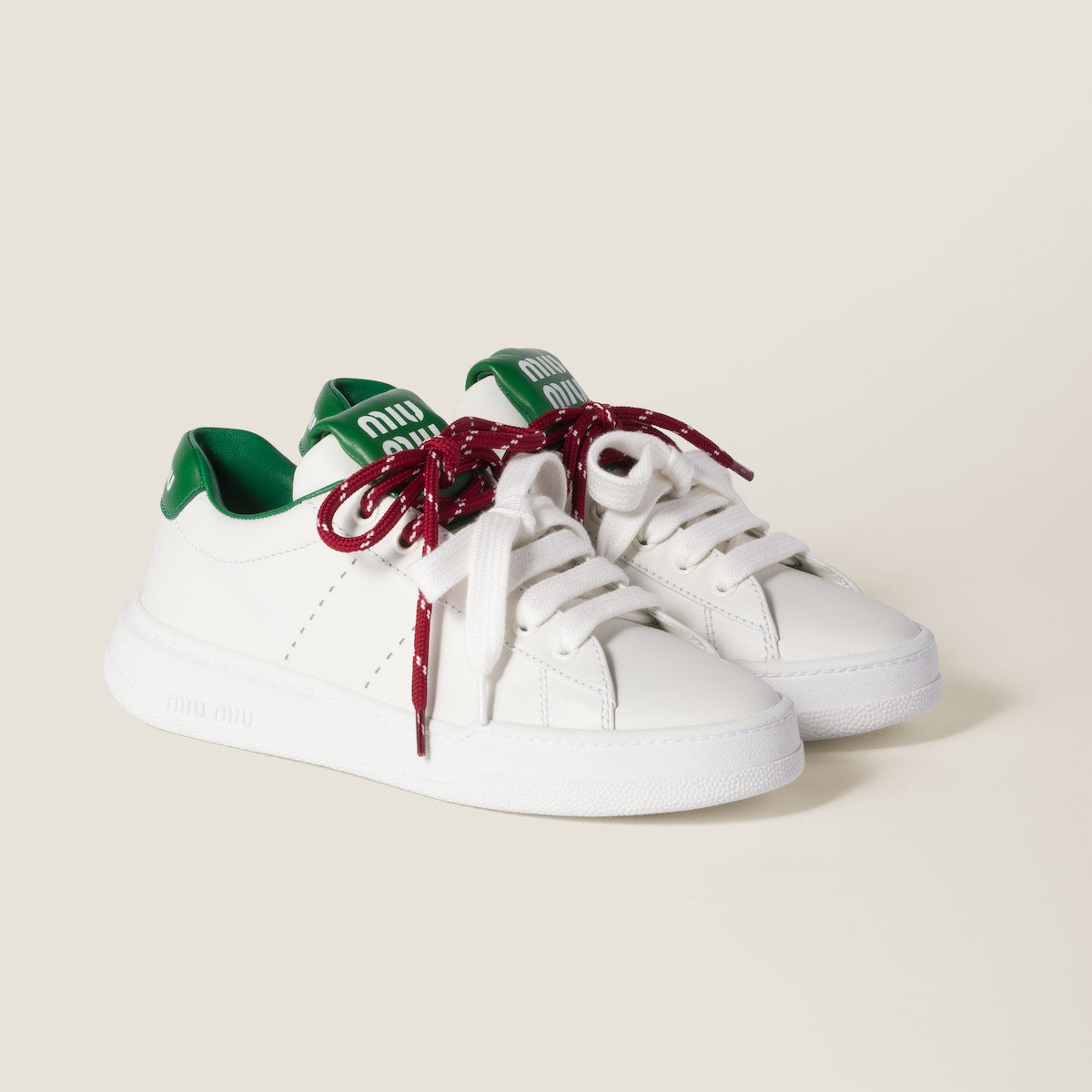 White/green leather sneakers