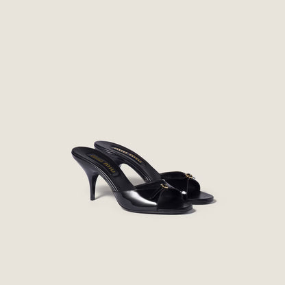 Black patent leather sandals with buckles