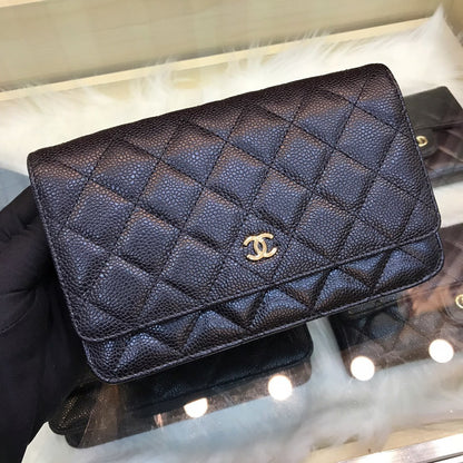 Black wallet with chain and gold logo