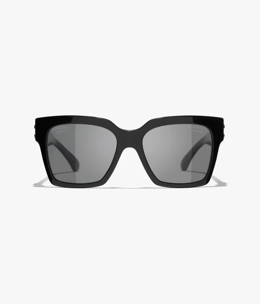 Occhiali da sole Butterfly in acetato nero con lenti nere