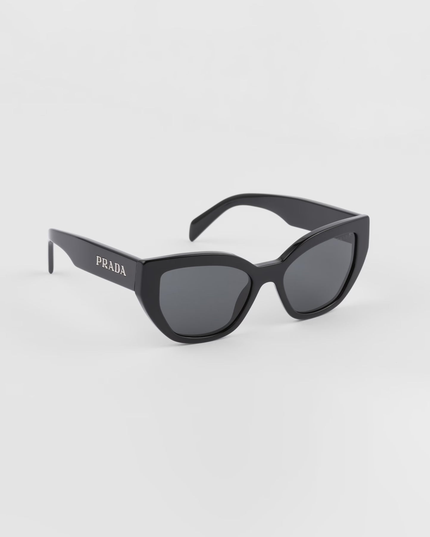 Black cat-eye sunglasses with logo