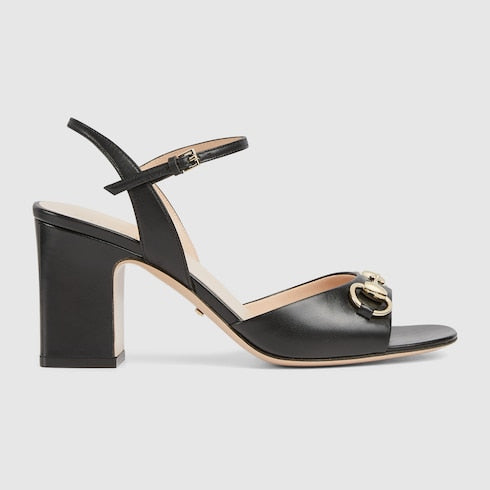 Women's black leather heeled sandal with snaffle