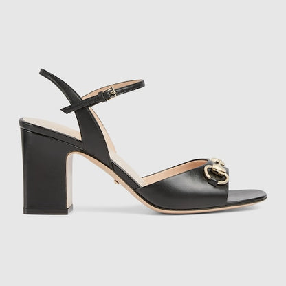 Women's black leather heeled sandal with snaffle