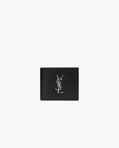 CASSANDRE East/West wallet in black smooth leather