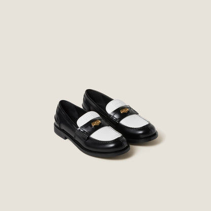 Black/white leather loafers