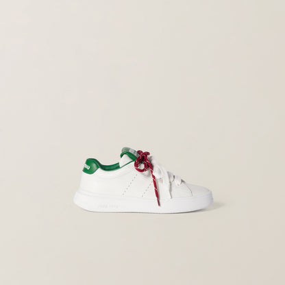 White/green leather sneakers