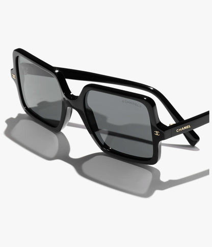 Occhiali da sole squadrati in acetato nero con lenti grigio scuro