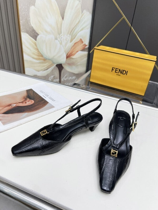 Black leather kitten heel pumps with gold FF buckles